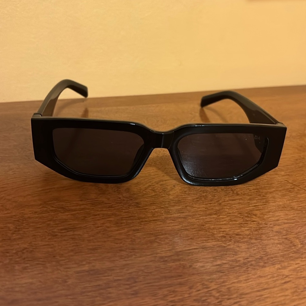 Prada - sunglasses